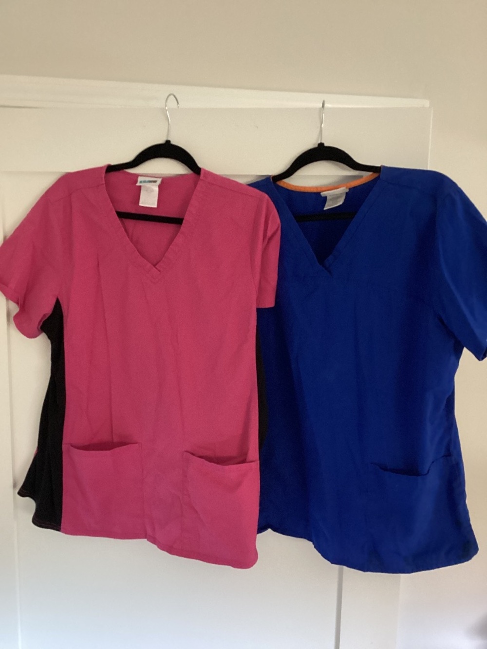 Two scrub tops